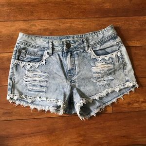 Distressed denim with lace detail